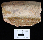 Gravel-tempered, interior (left) and exterior (right), pan. Delaware site 7NC-F-13. 